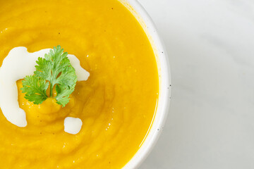 Canvas Print - pumpkin soup in white bowl