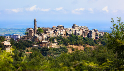 Canvas Print - View of the Beautiful City of Venzolasca on Corsica, with the Santa Lucia Church