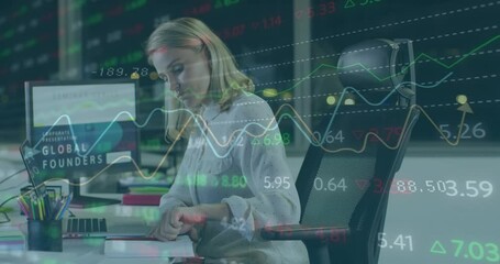 Poster - Animation of graphs, changing numbers, trading board over caucasian woman working on laptop