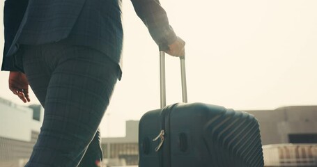 Poster - Back, hand and travel suitcase for person on walk, city and business trip and walking, airport or outdoor. Entrepreneur, luggage and street for commute, flight and transportation on hotel and road