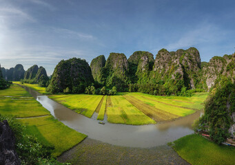 Wall Mural - Beautiful sunset landscape viewpoint from the top of Mua Cave mountain, Ninh Binh, Tam Coc in Vietnam