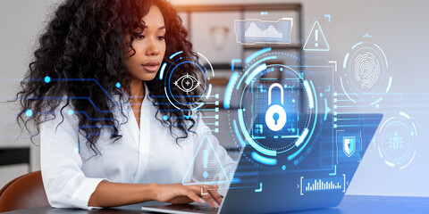 Poster - Black woman working in laptop, digital cybersecurity hud with glowing icons