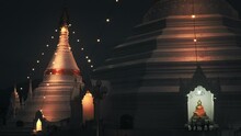 Beautiful White Buddhist Temple Pagoda At Night In Thailand. Stupa With Buddha And Lights Of Mae Hong Son 