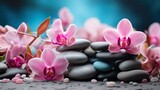 Fototapeta Kwiaty - Panoramic still life for harmony in spa, massage or yoga. Stack of spa mineral blueish tone pebbles with pink flowers on defocused wellness background Copy Space
