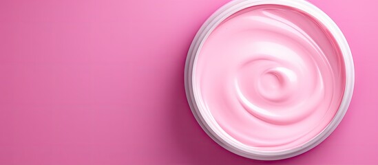 Poster - Fuchsia cosmetic cream on isolated pastel background Copy space