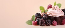 Fresh Berries Including Raspberries And Blackberries Atop A Chocolate Cupcake Against A Isolated Pastel Background Copy Space