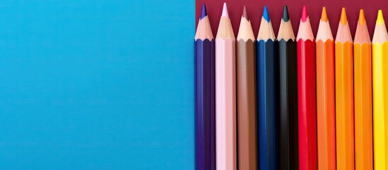 Aufkleber - Gorgeous vibrant pencils isolated pastel background Copy space