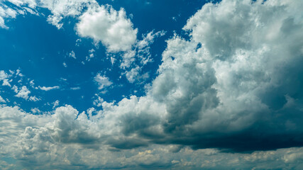 Wall Mural - A Drone View of a Summer Blue Sky With White Fluffy Clouds
