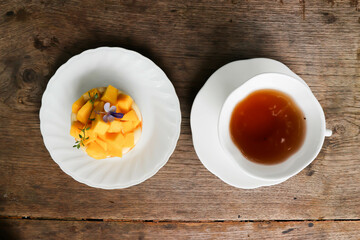 Wall Mural - mango cake or mango cheese cake , mango cheese pie and hot tea