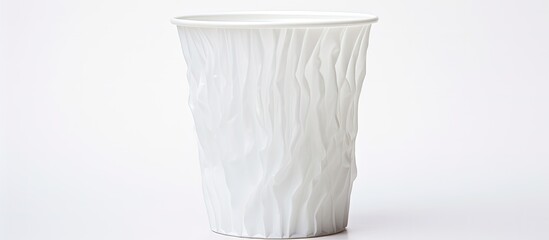 Wall Mural - Crumpled plastic cup on white backdrop