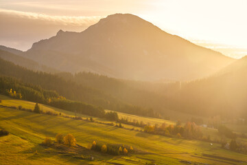 Wall Mural - Autumn rural landscape with mountain at sunset. The Orava region of Slovakia, Europe.