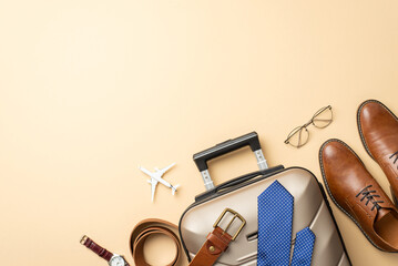 All set for a global business journey: top view tiny plane model with formal attire details – belt, necktie, leather shoes, suitcase, wristwatch, and glasses on a pastel beige background