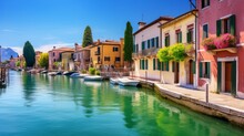 Peschiera Del Garda, A Picturesque Village Adorned With Colorful Houses, Nestled Along The Stunning Shores Of Lake Lago Di Garda In The Verona Province Of Italy