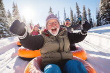 With Snowy Mountains As Their Playground, Senior Snow Tubers Bond Over Shared Adventures, Savoring The Magic Of Winter.
