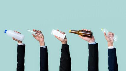 Businessman's hand holding garbage waste on isolated background. Eco-business recycle waste policy in corporate responsibility. Reuse, reduce and recycle for sustainability environment. Quaint