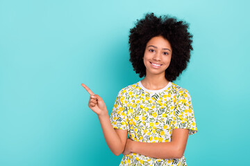 Sticker - Photo of cheerful small daughter girl young pupil recommend her school direct finger empty space isolated on aquamarine color background