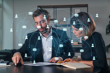 Businesspeople in formal wear taking notes signing contract at office workplace. Concept of important working moments, document sign, working process, concentration. Network hologram