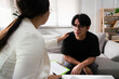 © Pichsakul - Psychologist woman giving counseling and encourage man with mental health problem in therapy center