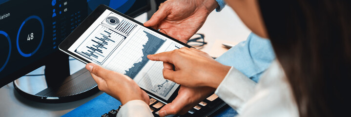 Poster - analyst working on data analysis or bi dashboard on computer monitor. business team analyzing financ