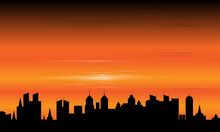 Cityscape Silhouette Sunset.  Sunset Over The City In Silhouette View.