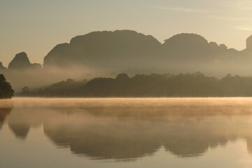 Wall Mural - Landscape Nature View of Nong Thale Lake in Krabi Thailand -beautiful limestone mountain with reflection on the lake Morning Sunrise view. Unseen In Krabi 