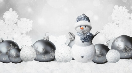 Wall Mural - One little snowmen in caps on snow in the winter. Background with a funny snowman. Christmas card.