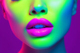 Portrait of a fashionable girl with neon makeup. Sexy girl. A woman in a nightclub.