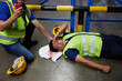 © offsuperphoto - senior worker fell over and his head is bleeding on the floor in the factory