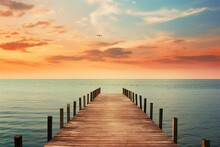 Wooden Dock Pier On The Water At Sunset, Sea Summer Background With Beautiful Landscape