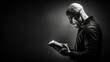 © Login - Profile of a balding middle-aged man with glasses holding an open book and reading it. Concept of self-development and cognition. Resting up for a favorite activity. Monochrome illustration for design