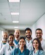 © Joana Stock  - A group of doctors and nurses smiling in a hospital - vertical image