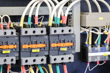 Poster - Close-up of Electricity distribution box with wires and circuit breakers in control room.