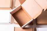 Fototapeta Lawenda - Lot of cardboard box, brown and white, mockup, opened, empty inside