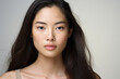 © Tetiana - Photo of cute adorable asian girl with long silky hair and clear smooth skin generative Ai