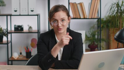 I choose you. Caucasian young business woman programmer software developer working on office laptop pointing to camera, looking with happy expression, making choice showing direction. Freelancer girl