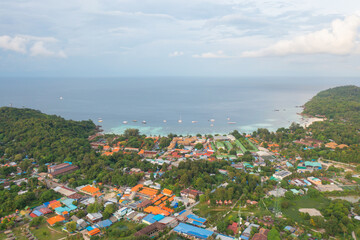 Aerial view of clear blue turquoise seawater, Andaman sea in Phuket island in summer season, Thailand. Water in ocean pattern texture wallpaper background.