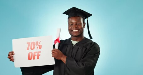 Wall Mural - Graduation, sales sign or happy black man with university advertising, scholarship discount or college study opportunity. Studio portrait, 70 percent or student poster presentation on blue background