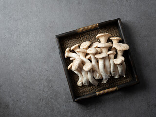 Poster - Pile of mushrooms on wooden plate