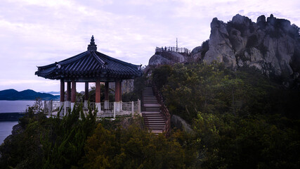 Wall Mural - Mokpo City Yudal Mountain Peak and Kwan Woon Pavilion at sunset in South Korea