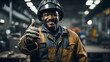 A skilled welding technician proudly shows a thumbs-up gesture, isolated in the frame.