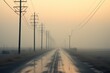 © visoot - A strip of power poles along a highway.