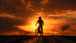 silhouette of a bike rider person on a sunset