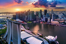 Aerial View Of Singapore City At Sunset.