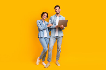 Aufkleber - Photo of two people managers lady guy using netbook browsing typing email isolated bright color background
