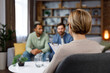 LGBT family at a psychotherapist's appointment. A family psychologist conducts a session in a beautiful office. Psychologist for gay. Support for the LGBT community on a visit to a psychologist.