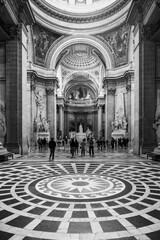 Interior with ornamental mosaic floor of Pantheon in Paris, France. Black and white photography.