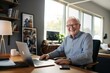 © koala studio - Happy senior businessman having a virtual meeting at home