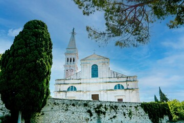 Canvas Print - Church with trees in the foreground