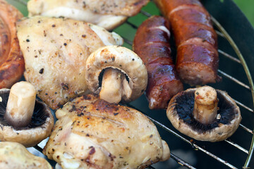 Canvas Print - barbecue with delicious grilled meat and mushrooms