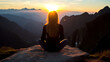 Frau meditiert beim Sonnenuntergang in den Bergen